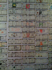 Mel Chin's Fundred Dollar Bill Project is designed to: